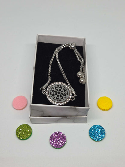 Silver coloured perfume diffuser bracelet with flower head design - MAZAROMA