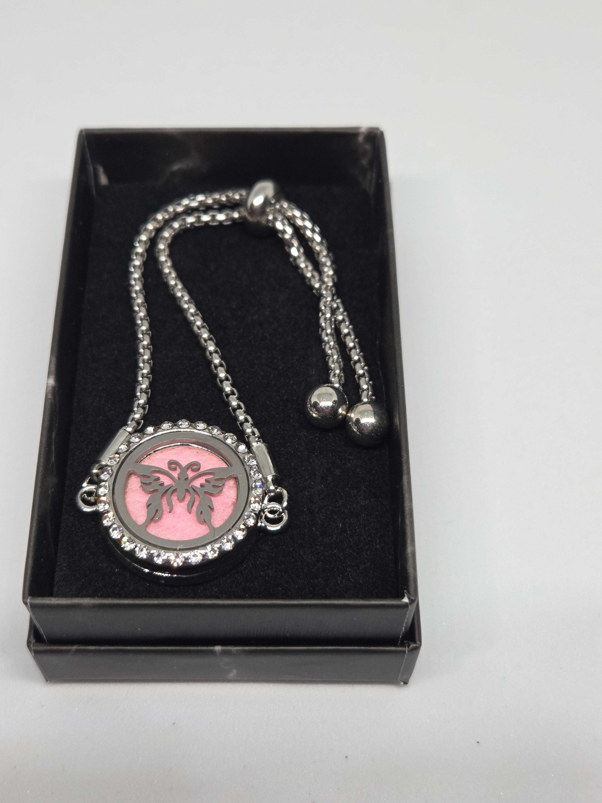 Silver coloured perfume diffuser bracelet butterfly design - MAZAROMA