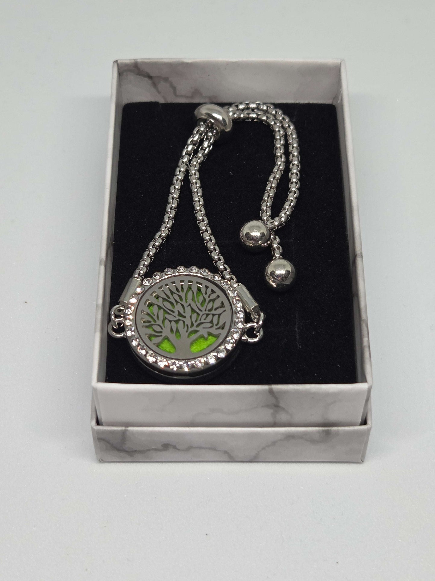 Silver coloured perfume diffuser bracelet with extended branches tree design - MAZAROMA