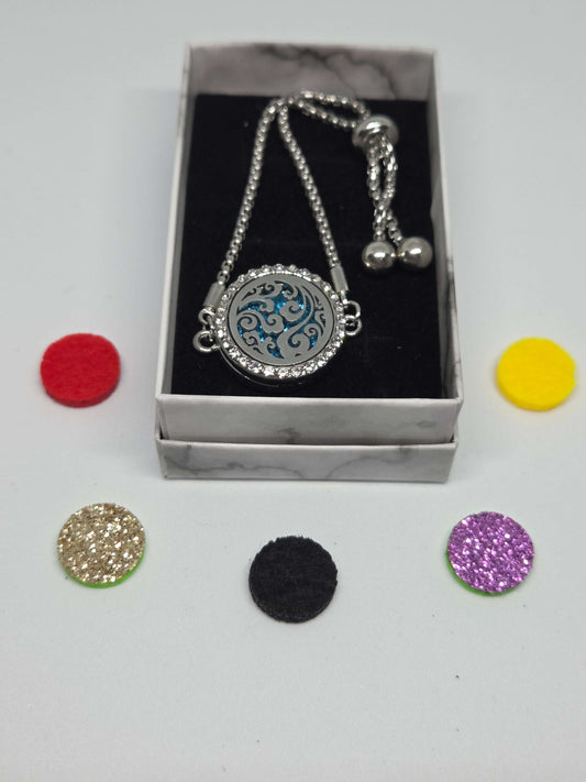 Silver coloured perfume diffuser bracelet swirls design - MAZAROMA