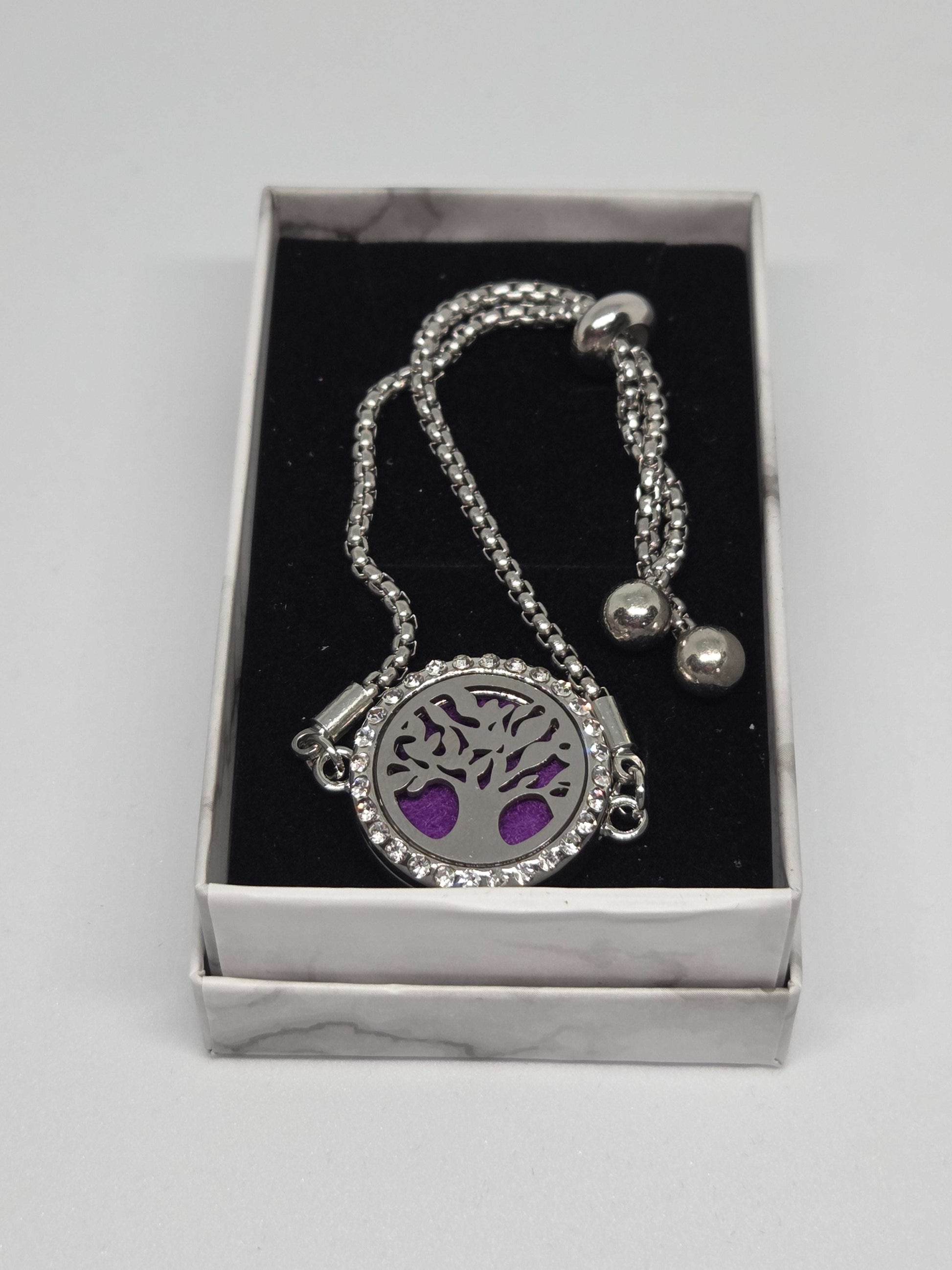 Silver coloured perfume diffuser bracelet in a tree design - MAZAROMA
